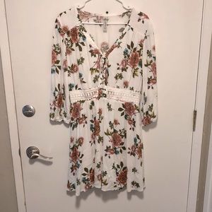 American Rag brand. Worn once, white base with floral design. Size large.